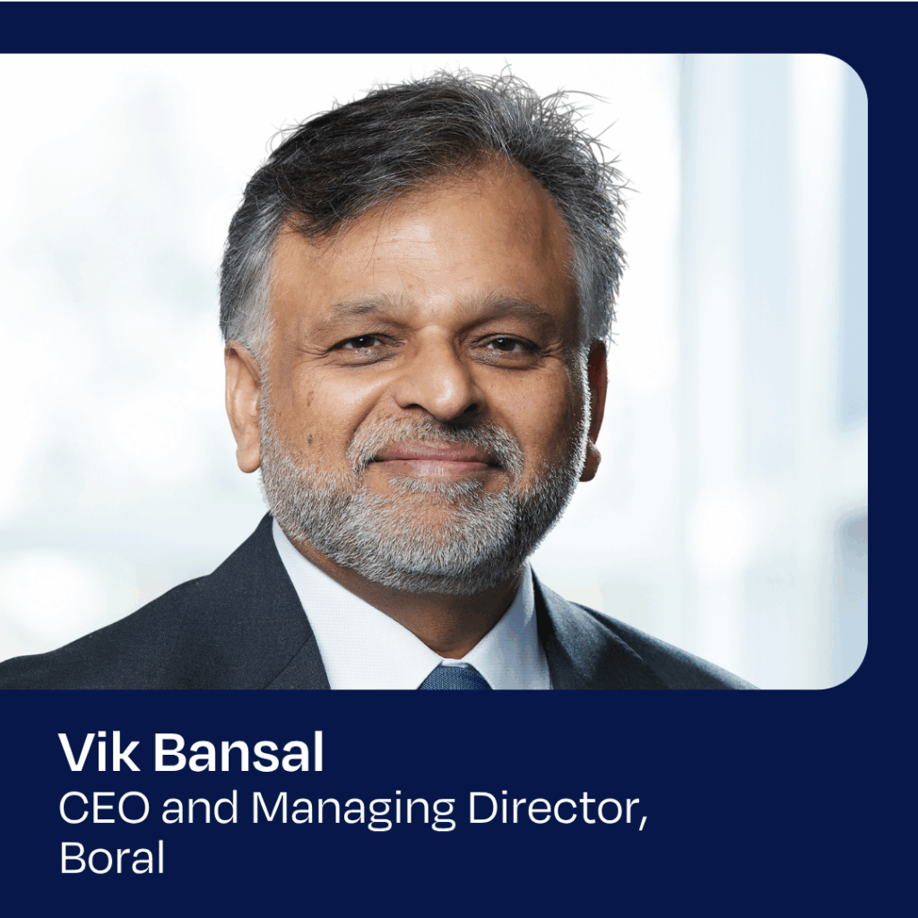 A professional portrait of a man with black and grey hair, wearing a shirt, tie and jacket. The words under the image are "Vik Bansal, CEO and Managing Director, Boral"