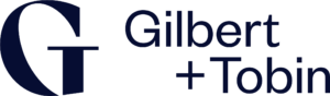 Logo for Gilbert + Tobin in blue writing
