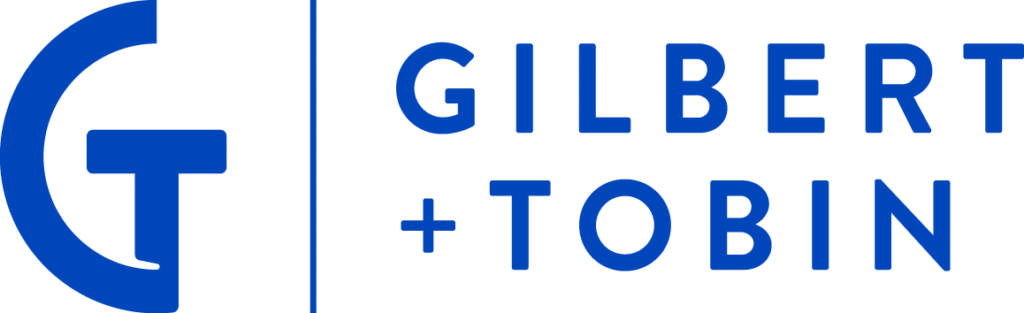 Loo for Gilbert + Tobin in blue writing