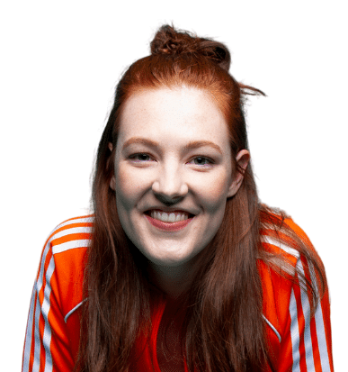 Lou Wall wearing a red jacket with white stripes along the arms