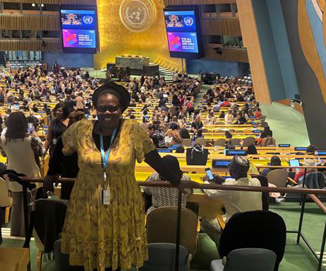 Dr Virginia Mapedzahama standing inside the UN at CSW69